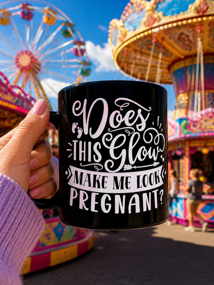 Hand holding pregnancy announcement mug. | GrindGlow Apparel